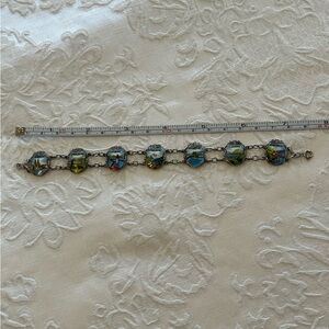 Vintage enamel charm bracelet of Swiss towns.